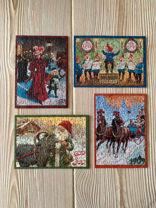 4 x Juleminipuslespil med 99 brikker fra Penny Puzzle