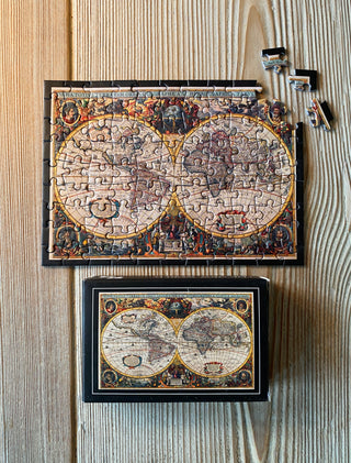 The New World vintage minipuslespil med 99 brikker fra Penny Puzzle.