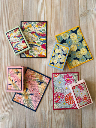 4 x Japansk minipuslespil med 99 brikker fra Penny Puzzle.