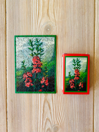 MOUNTAIN BLOSSOMS minipuslespil 99 brikker fra Penny Puzzle.