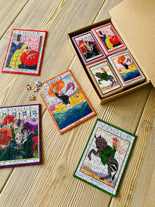 4 x Modeblad minipuslespil med 99 brikker fra Penny Puzzle.
